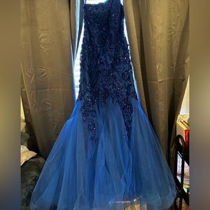 Size 14, royal blue, Morilee prom dress. Picture of dress on person provided.